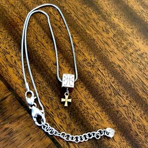 Two tone moveable cross necklace